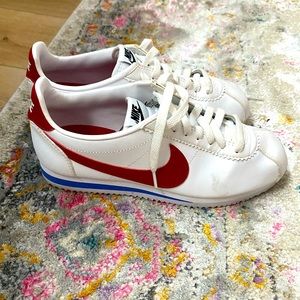 Nike Women’s White Sneakers with Red Swoosh and Blue Trim